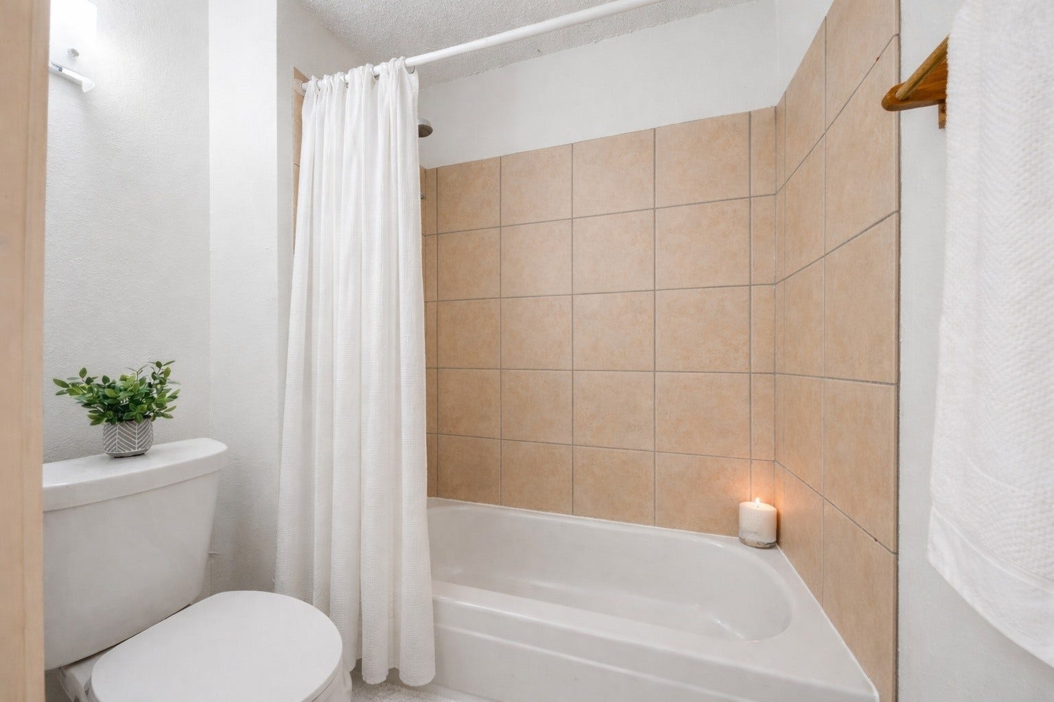 6701 Sands Point Drive, #61, Houston, TX 77074 Primary bathroom with separate toilet and shower area.