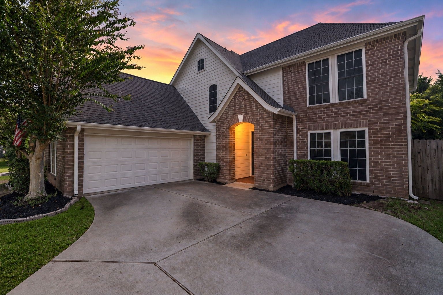 2915 Cane Field Drive, Sugar Land, TX 77479 Two-car garage with an extended driveway offering plenty of additional parking space.