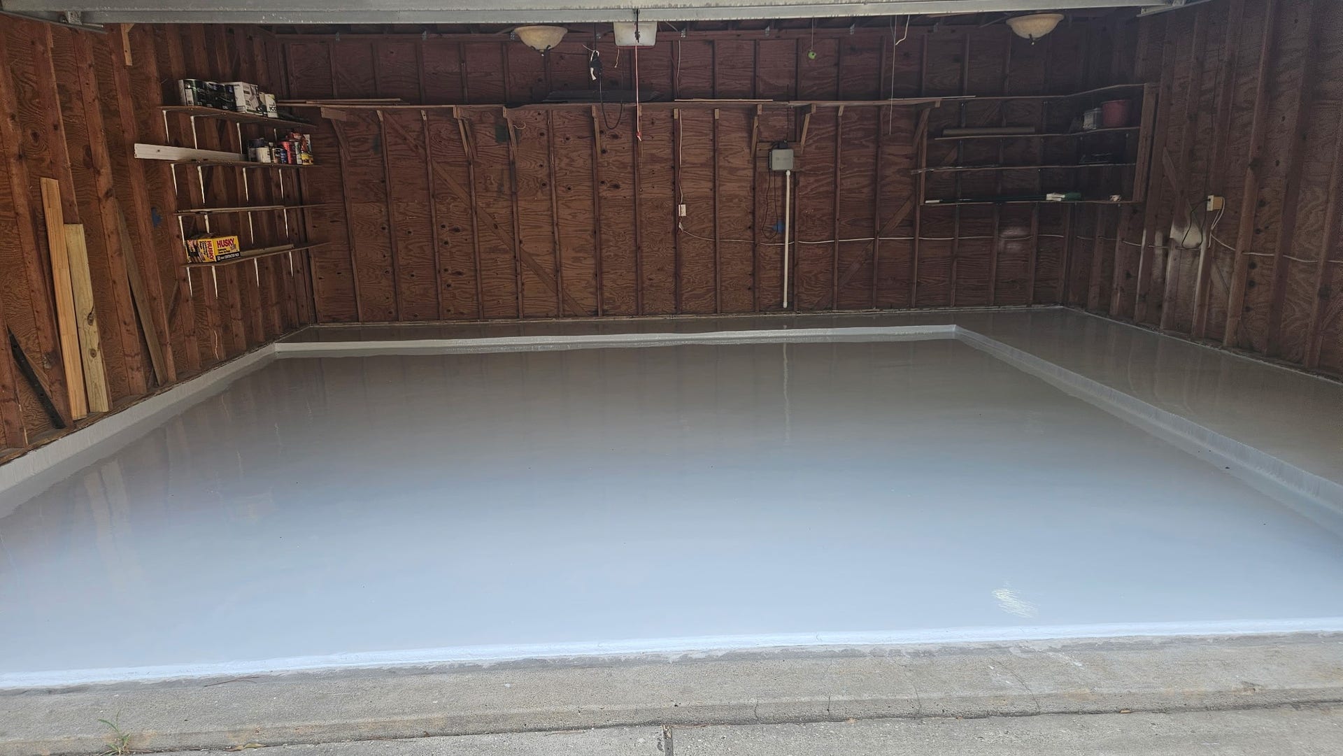 708 Bayou Crest Circle, Dickinson, TX 77539 Garage floor has professionally installed epoxy coating.