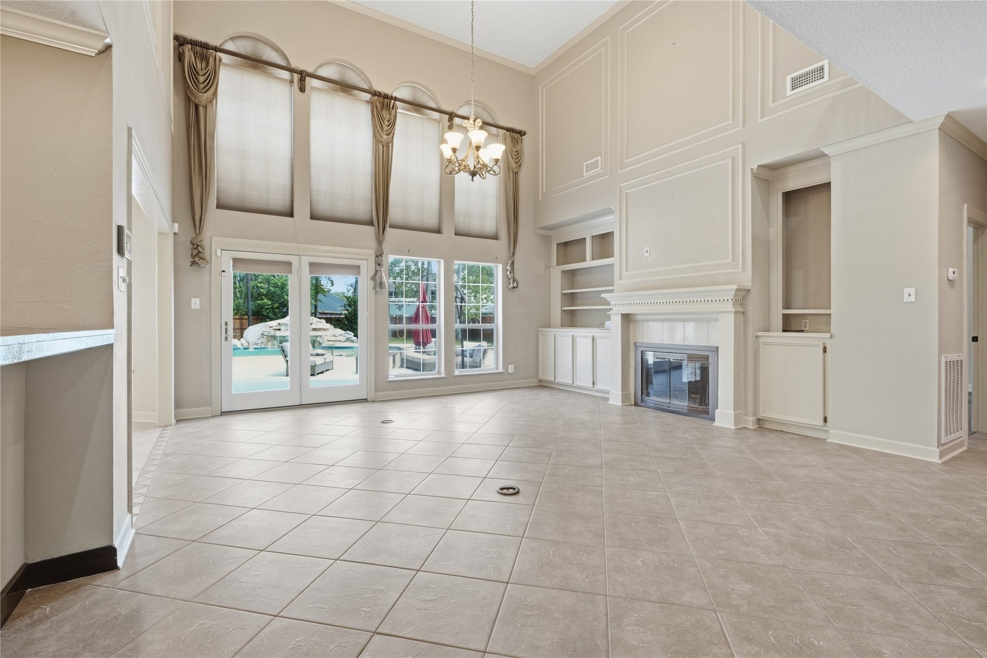 708 Bayou Crest Circle, Dickinson, TX 77539 Living are with huge windows for natural light.