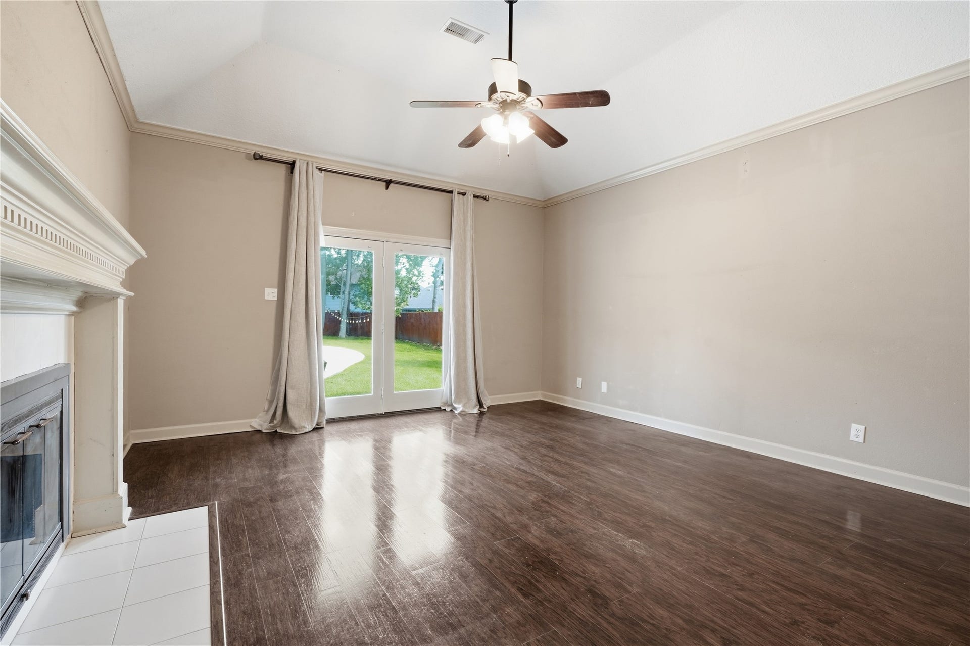 708 Bayou Crest Circle, Dickinson, TX 77539 incredible primary suite with fireplace doors to outdoors