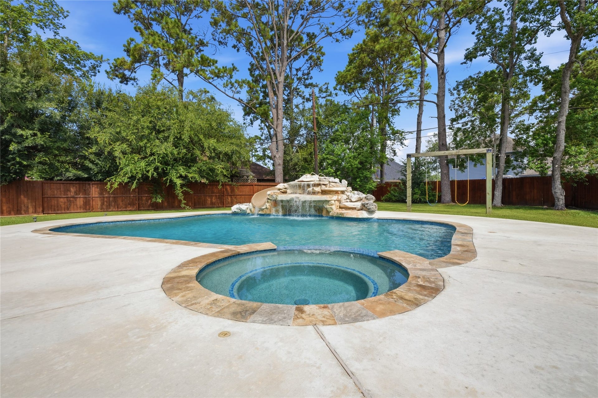 708 Bayou Crest Circle, Dickinson, TX 77539 Pool with waterfall and slide