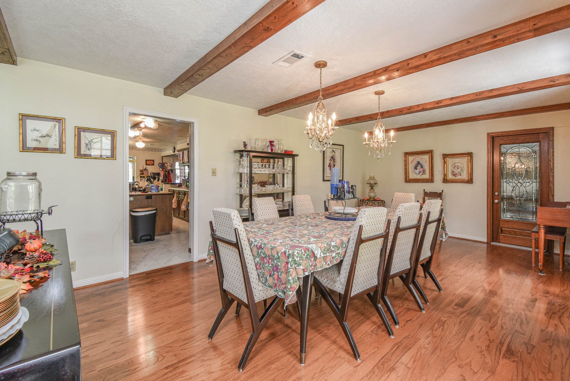 4503 Allen Genoa Road, Pasadena, TX 77504 LARGE FORMAL DINING ROOM w/BEAMED CEILING & WOOD FLOORS. EASY KITCHEN ACCESS.