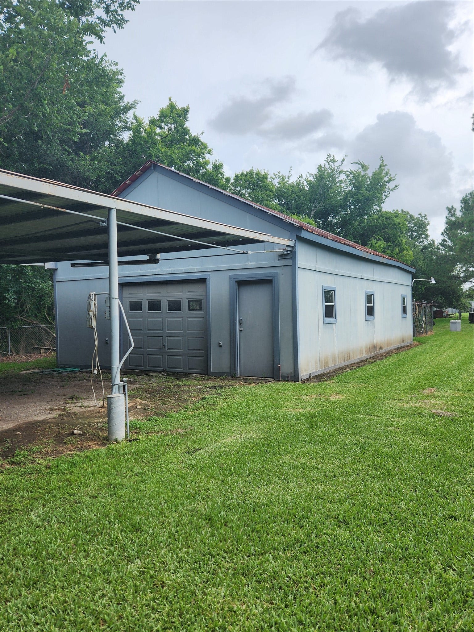 4503 Allen Genoa Road, Pasadena, TX 77504 VIEW OF CARPORT & DETACHED GARAGE