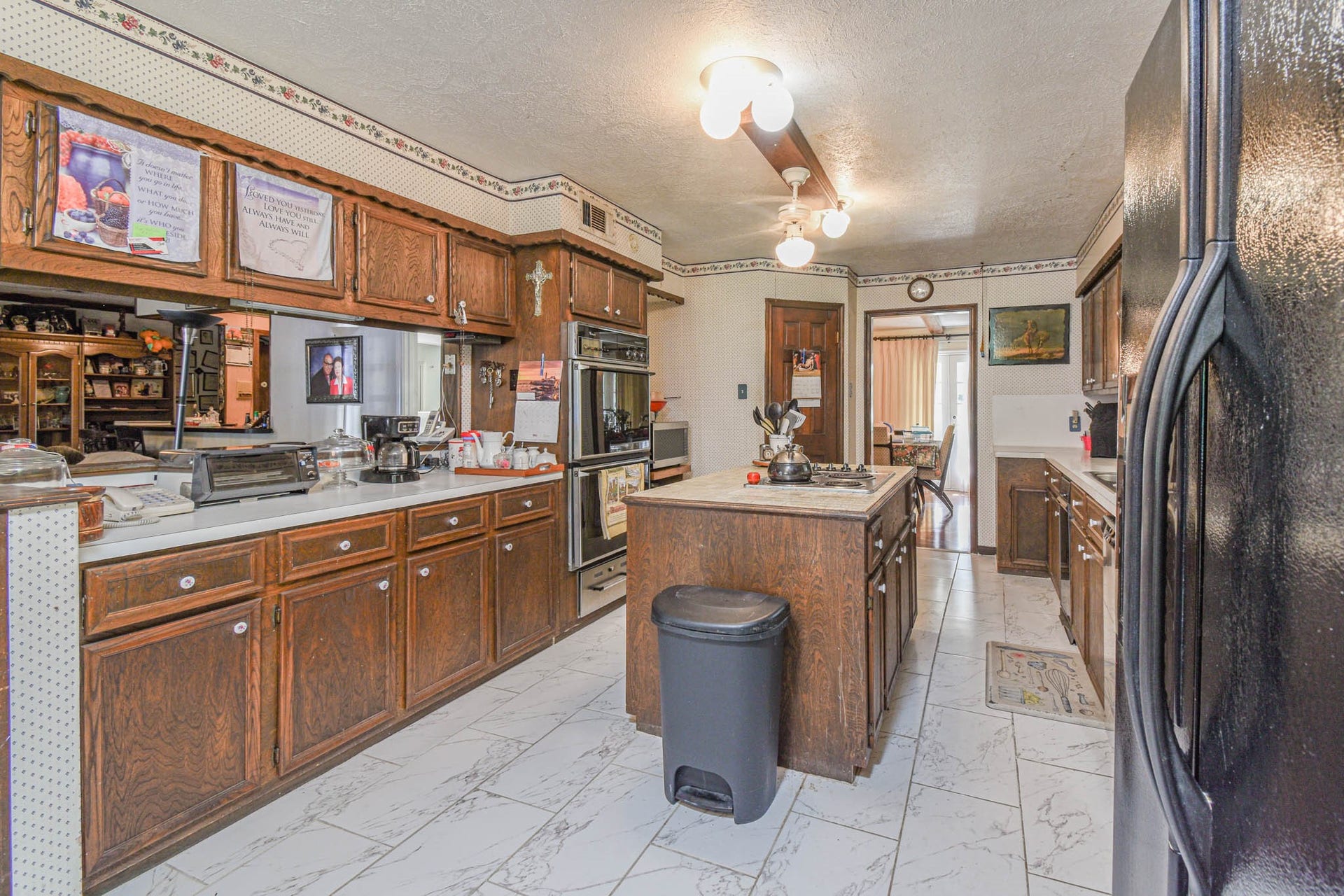 4503 Allen Genoa Road, Pasadena, TX 77504 GENEROUS ISLAND KITCHEN AND TON OF CABINETS & COUNTERSPACE.