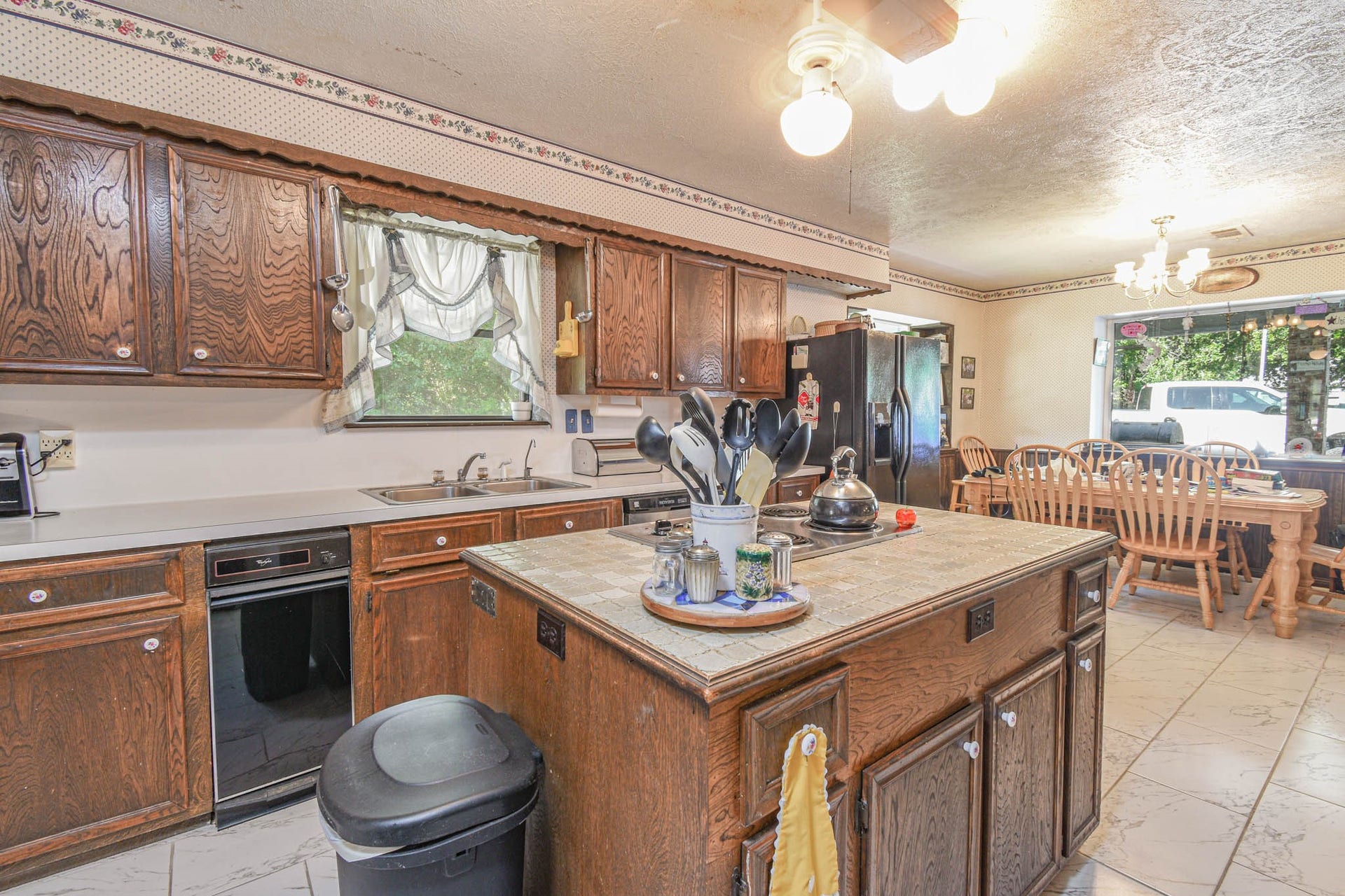 4503 Allen Genoa Road, Pasadena, TX 77504 KITCHEN HAS COOKTOP IN ISLAND, DOUBLE OVEN, DISHWASHER & TRASH COMPACTOR