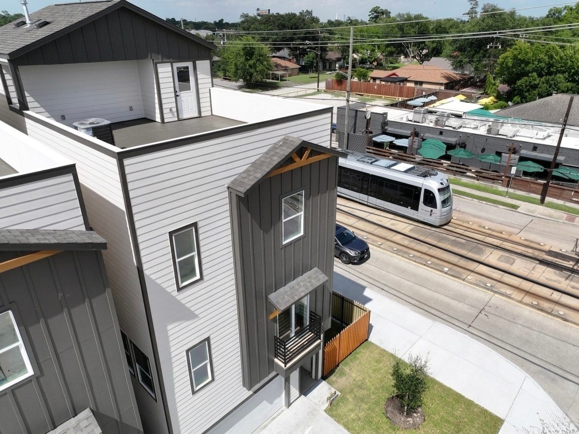 102 Sylvester Road, #C, Houston, TX 77009 Contemporary multi-level home with a spacious rooftop terrace, conveniently located near a light rail line for easy commuting.