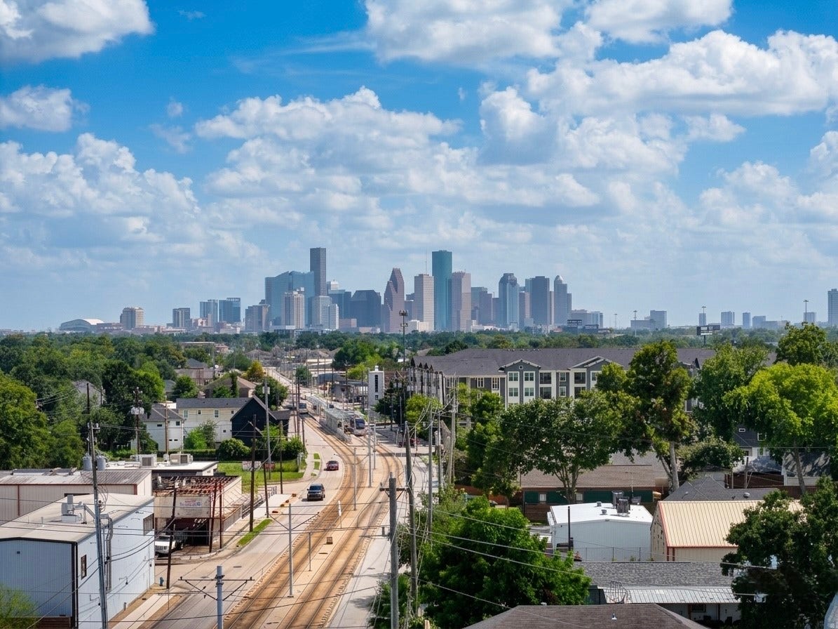 102 Sylvester Road, #C, Houston, TX 77009 Stunning urban view with a vibrant city skyline, surrounded by lush greenery and charming neighborhood streets. Perfect blend of city life and suburban tranquility.