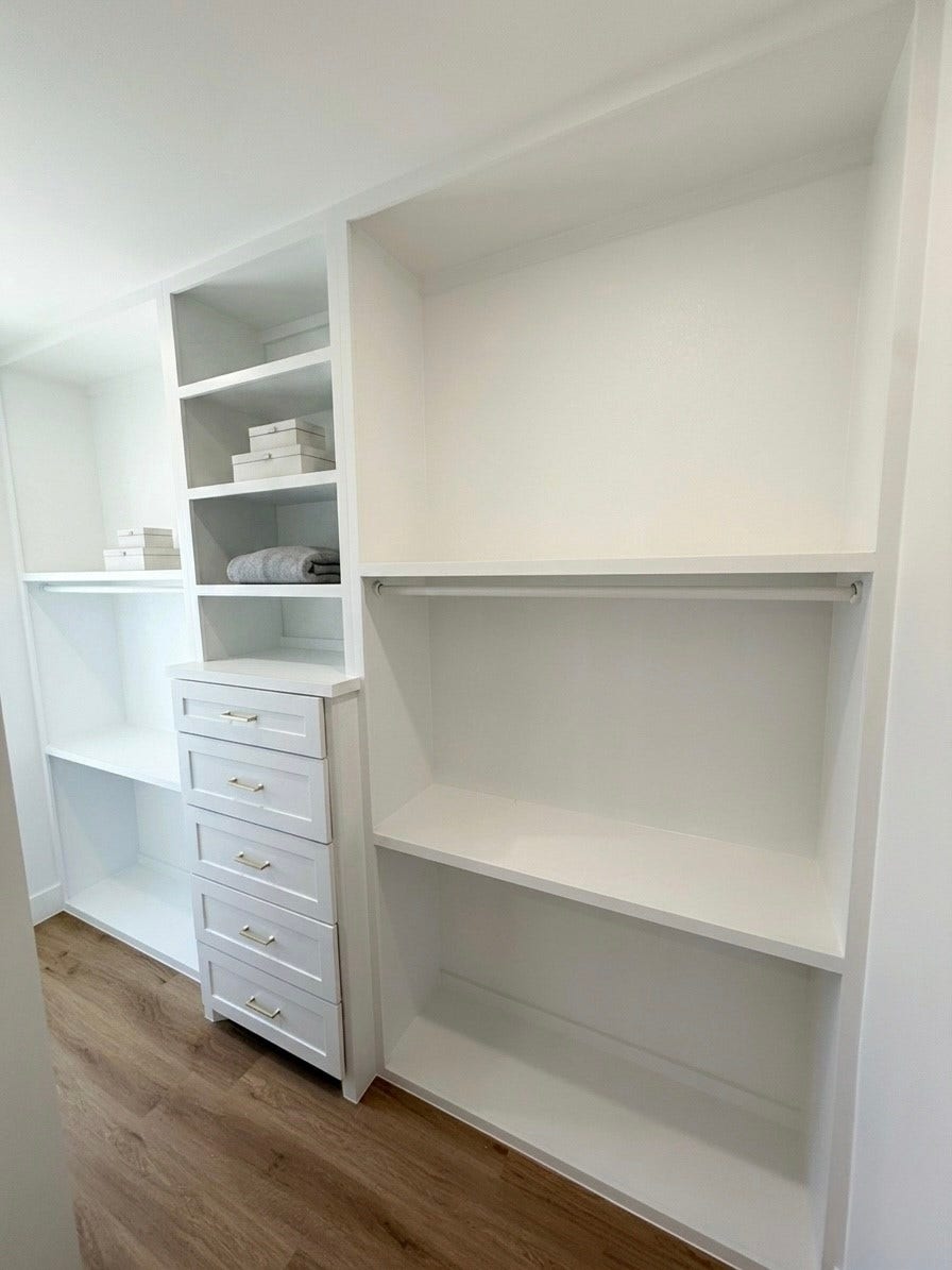 102 Sylvester Road, #C, Houston, TX 77009 Spacious walk-in closet with custom shelving, ample storage, and elegant engineered hardwood flooring.