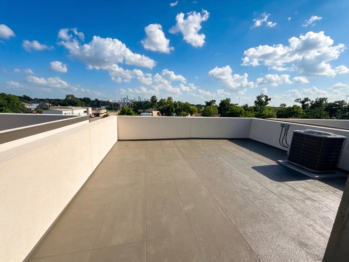 102 Sylvester Road, #C, Houston, TX 77009 Expansive rooftop terrace with panoramic views, perfect for outdoor entertaining and relaxation.