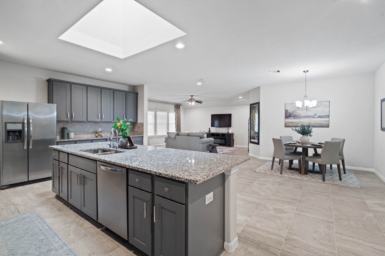 10110 Whitney Reach Drive, Rosharon, TX 77583 Kitchen open to family room.
