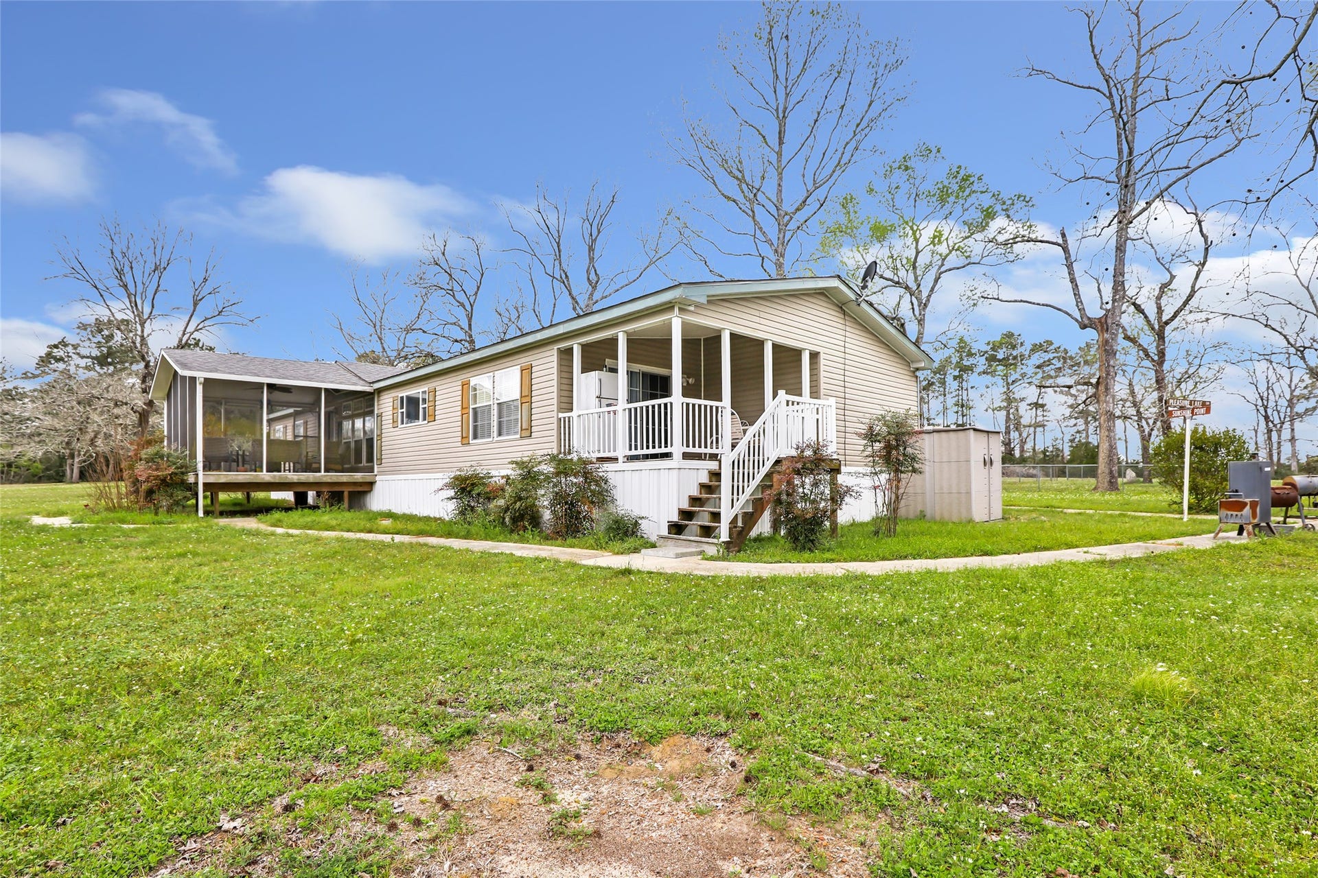 17659 E FM 1097 ROAD, Willis, TX 77378 Enjoy sitting on the screened in porch... Porch was added in 2018... Home is in Pristine Condition...