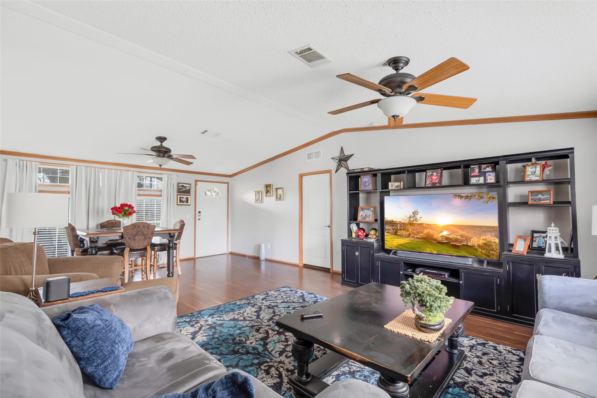 17659 E FM 1097 ROAD, Willis, TX 77378 VIEW OF LIVING TO FRONT ENTRY THAT LEADS OUT TO SCREENED IN PORCH...