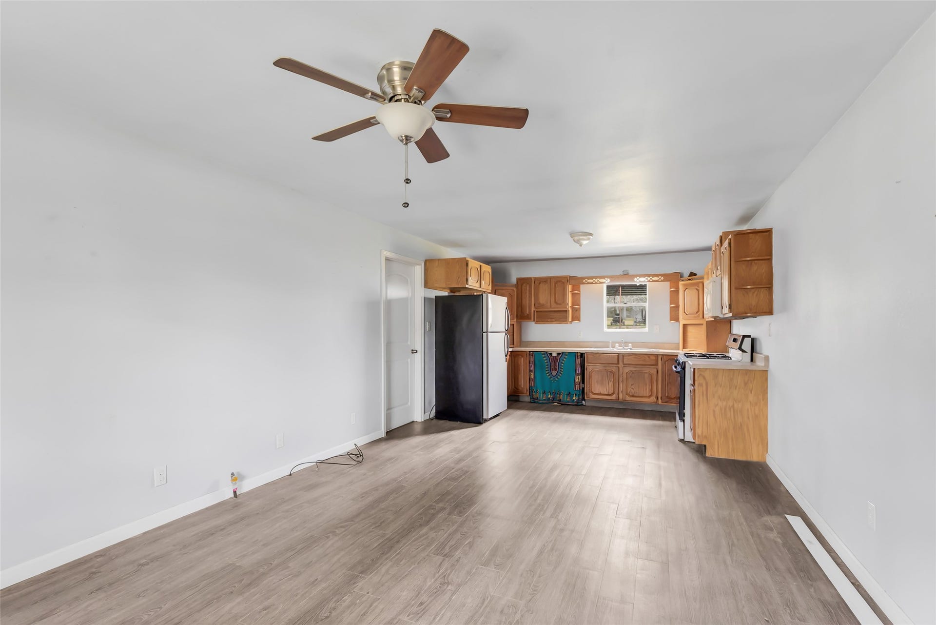 17659 E FM 1097 ROAD, Willis, TX 77378 SMALL HOME IN FRONT - VIEW OF LIVING/DINING AREA AND KITCHEN...