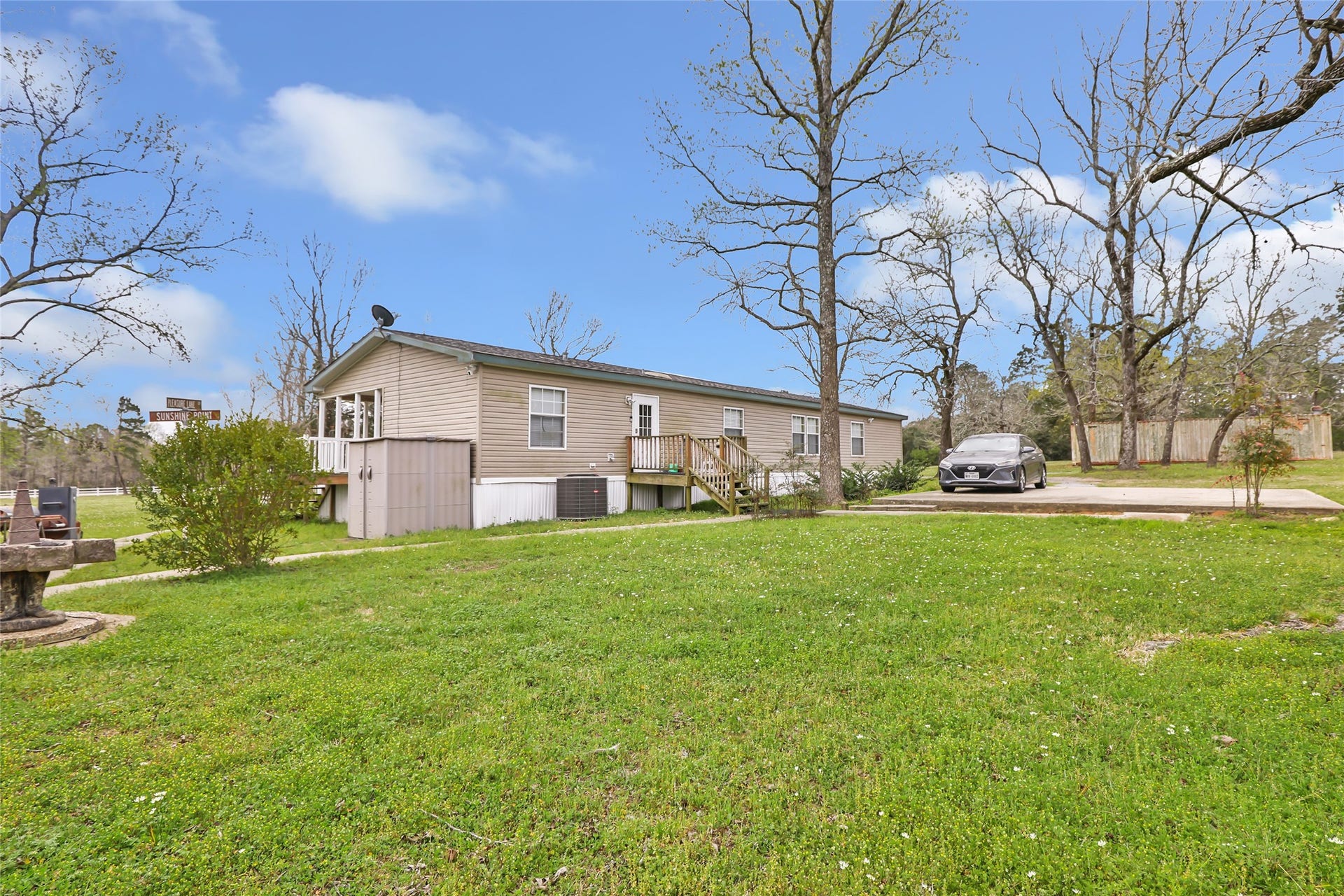 17659 E FM 1097 ROAD, Willis, TX 77378 BACK SIDE VIEW OF THE MAIN HOME FROM NORTH EAST CORNER OF PROPERTY...