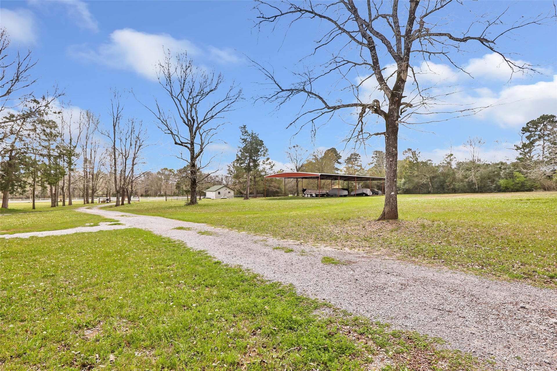 17659 E FM 1097 ROAD, Willis, TX 77378 VIEW FROM FRONT OF HOME TO FRONT OF THE PROPERTY THAT LEADS OUT TO FM 1097 EAST... SEE GUEST HOUSE, CASITA IN FRONT OR MAKE IT A RENTAL...