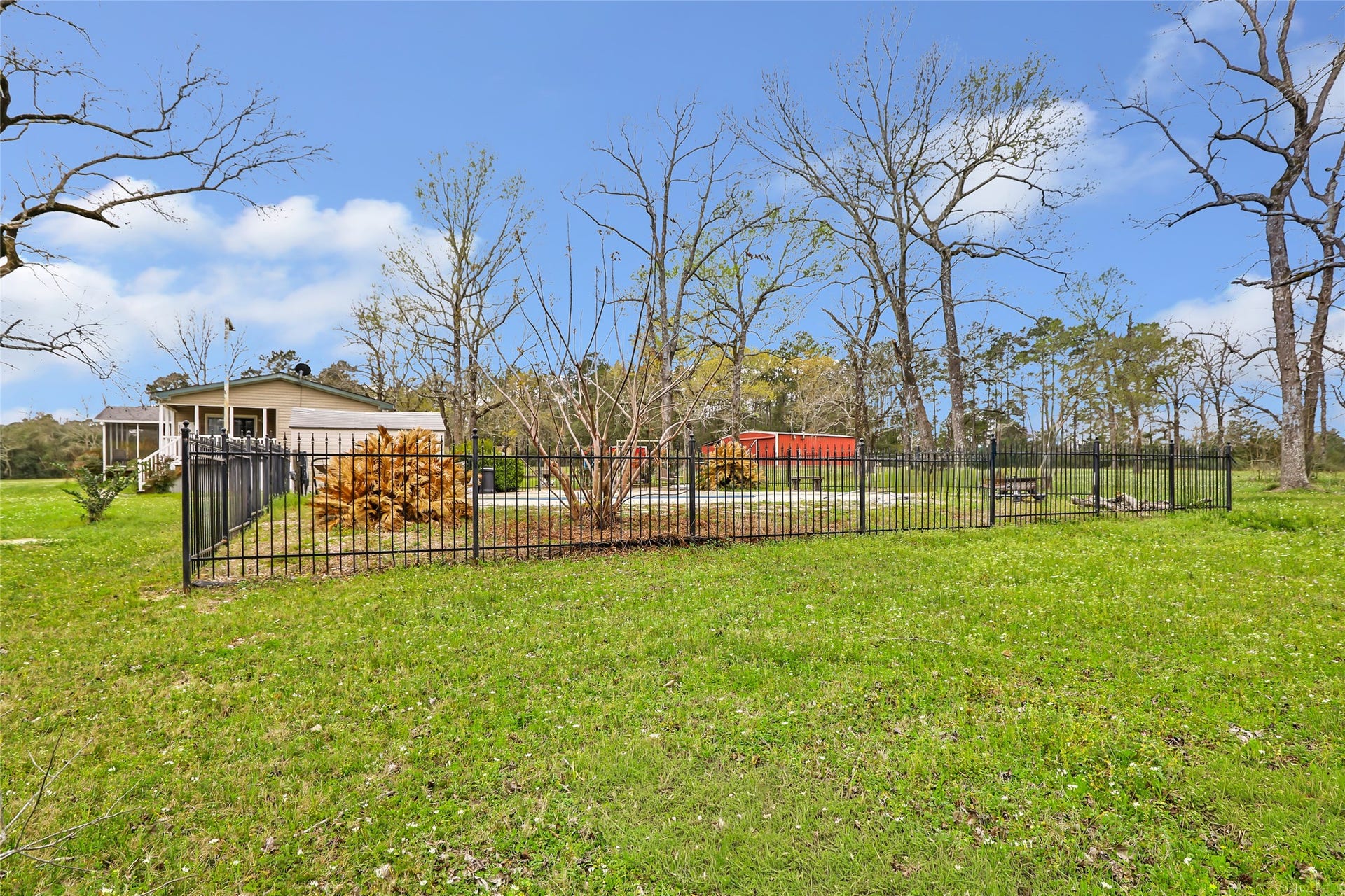 17659 E FM 1097 ROAD, Willis, TX 77378 FENCED & GATED AREA AROUND THE POOL...
