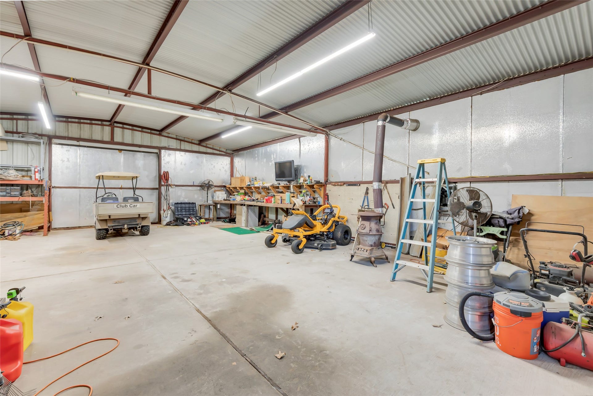 17659 E FM 1097 ROAD, Willis, TX 77378 INSIDE SHOP 30' X 40' METAL SHOP...NICE AREA FOR WORKING OR PARKING ALL YOUR EQUIPMENT...