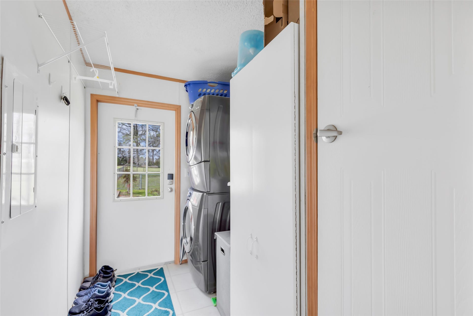 17659 E FM 1097 ROAD, Willis, TX 77378 UTILITY ROOM LEADS TO BACK ENTRY OF HOME...& CLOSET SPACE...