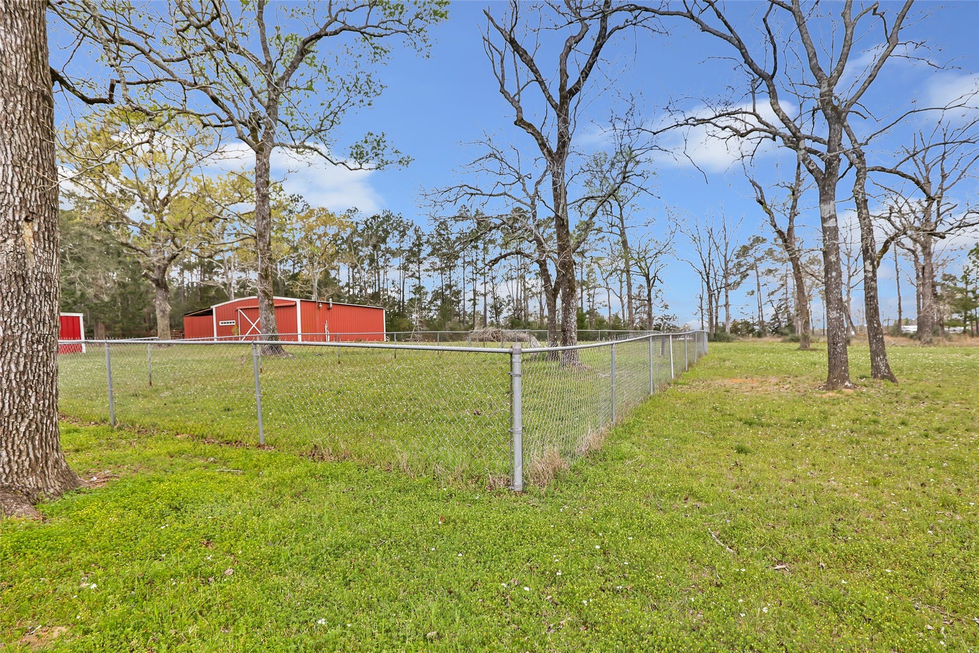 17659 E FM 1097 ROAD, Willis, TX 77378 FENCED AREA COULD BE USED FOR A GARDEN OR A DOG RUN...