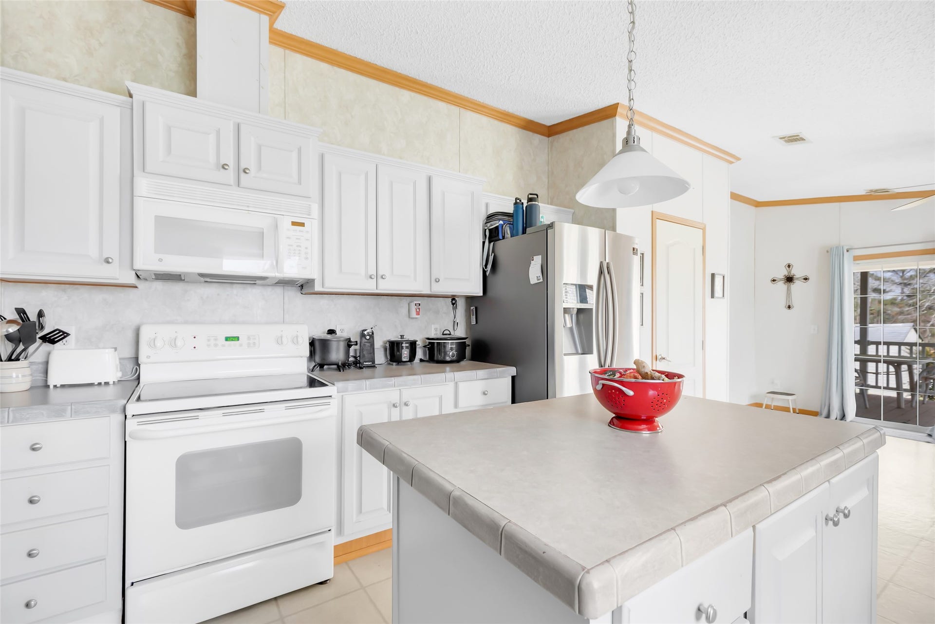 17659 E FM 1097 ROAD, Willis, TX 77378 THE ISLAND IS A GREAT PREPPING AREA AND PLENTY OF CABINETS FOR STORAGE...