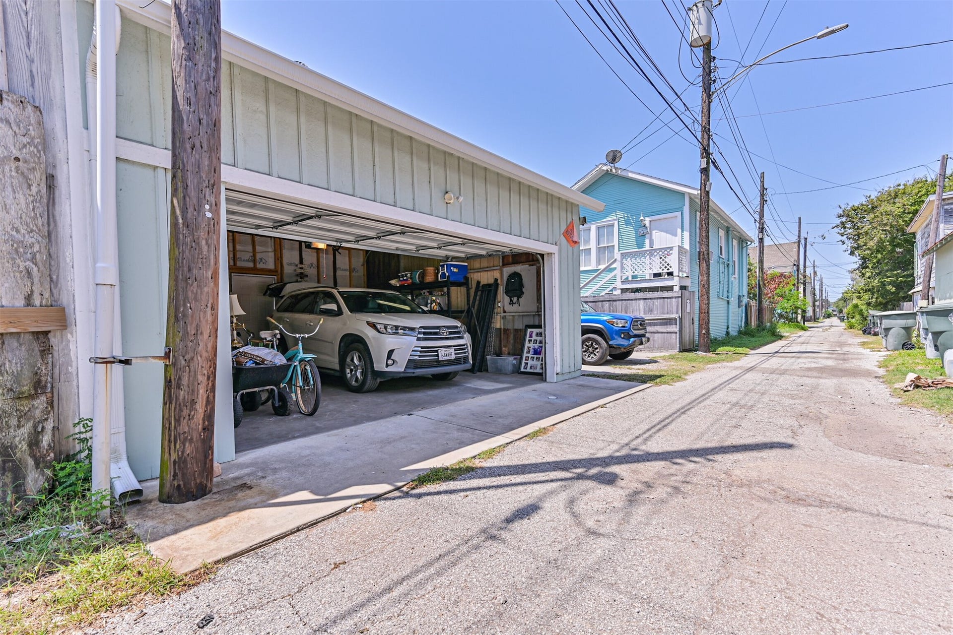 Large two car garage with alley access.