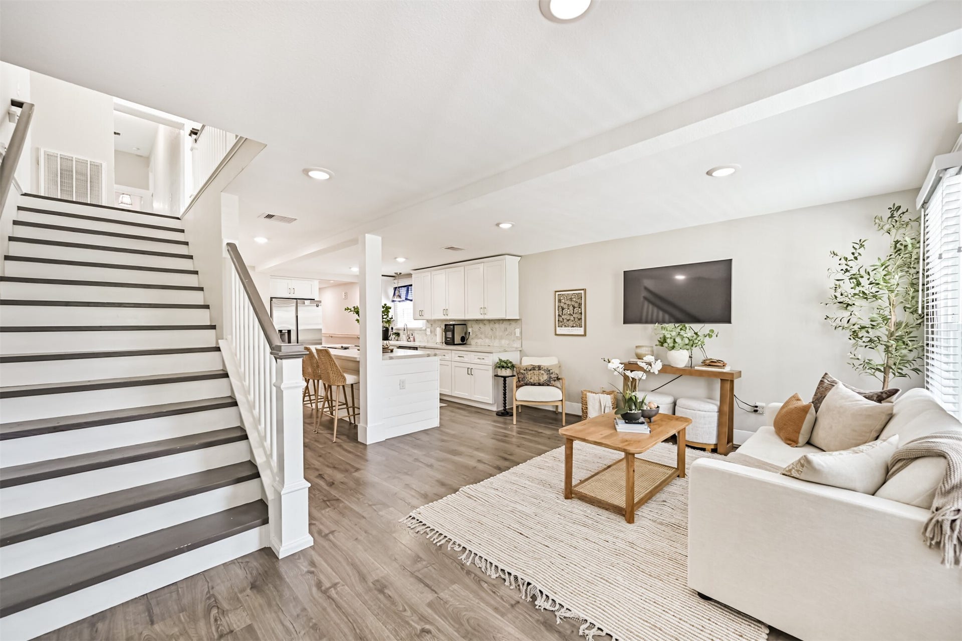 Wide staircase leading to second floor.