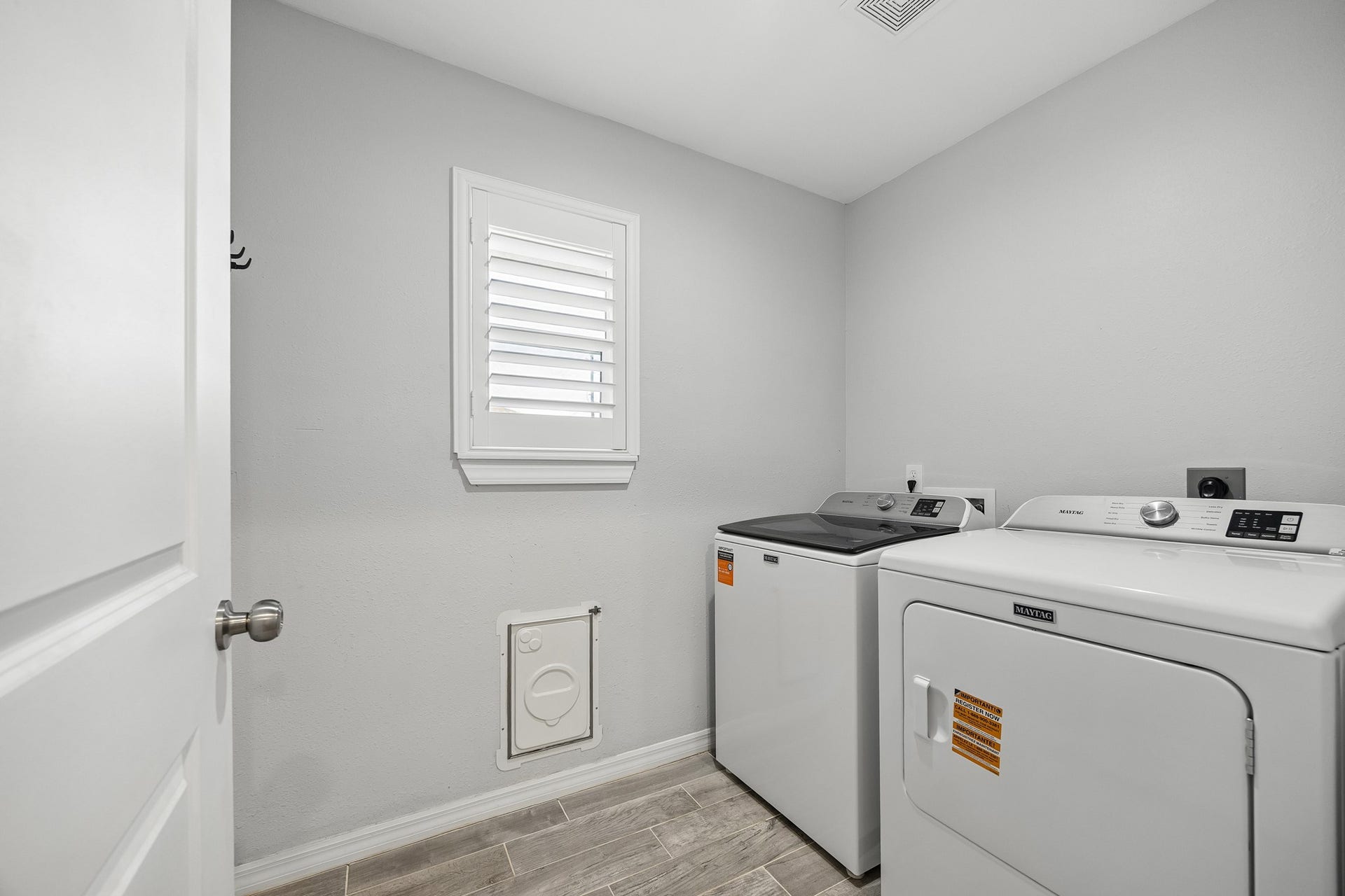 The second front bedroom provides another versatile space for family, guests, a home office, or nursery, with the shared full bathroom thoughtfully positioned nearby between both rooms.