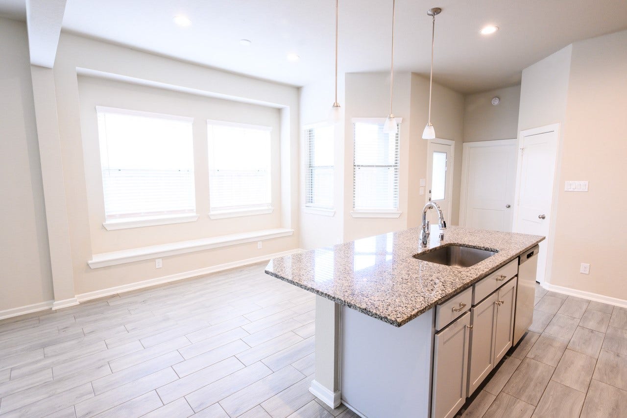 7912 Spring Run Drive, Magnolia, TX 77354 A lot of light throughout the house