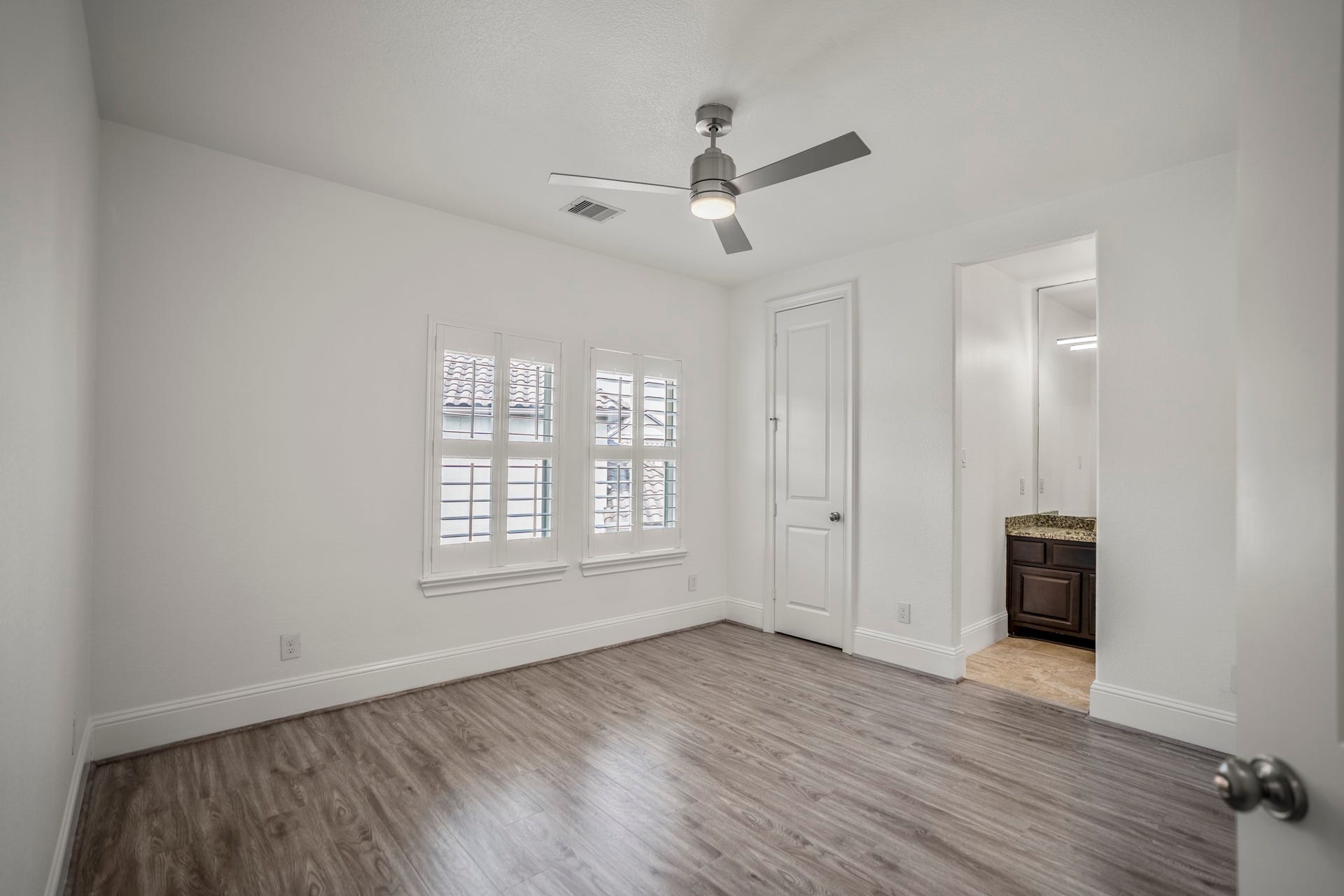 Another secondary bedroom on the third floor with a walk-in closet and jack & jill bathroom.