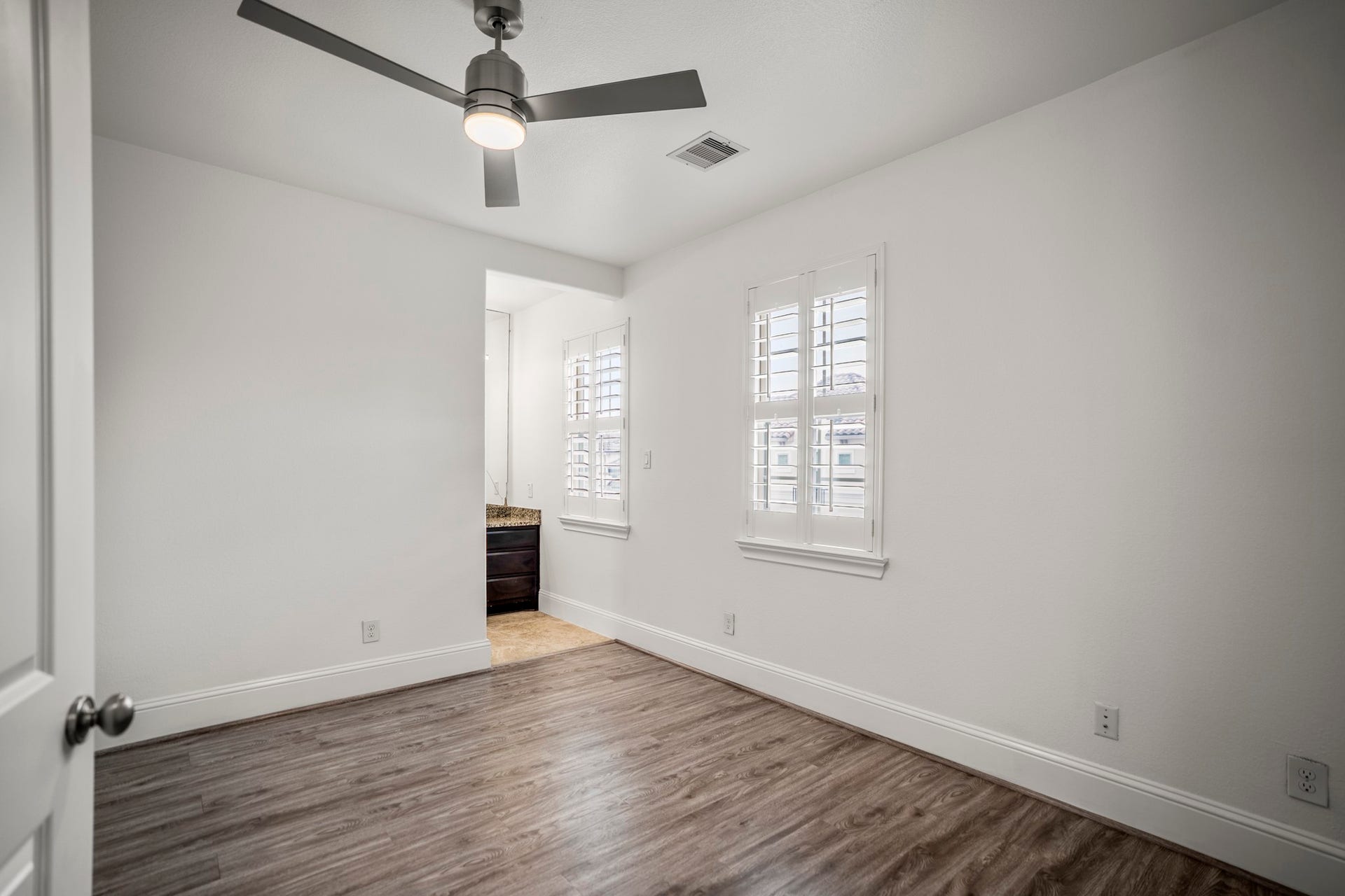 The third secondary bedroom on the third floor with a walk-in closet and jack & jill bathroom.
