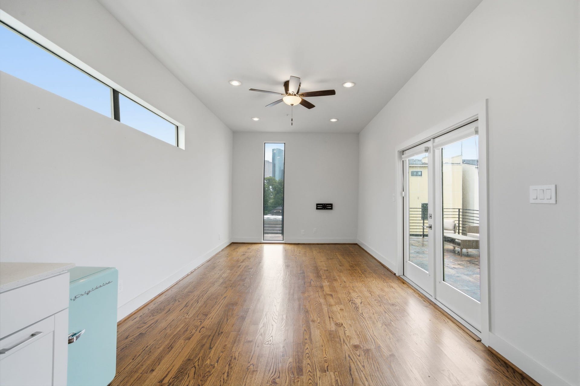 1215 Summer Street, #C, Houston, TX 77007 4th floor - game room + HUGE ROOFTOP DECK with DOWNTOWN views! There is also a half bath on this floor, making it super convenient whilst entertaining friends and family