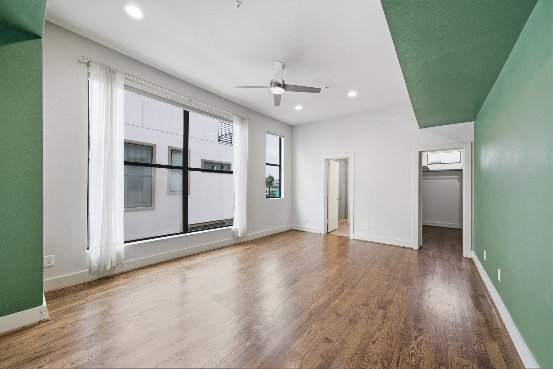 1215 Summer Street, #C, Houston, TX 77007 This is your Primary Bedroom OASIS! Doorway on the right is the LARGE WALK-IN CLOSET, and the doorway on the left is the Primary en-suite bathroom!