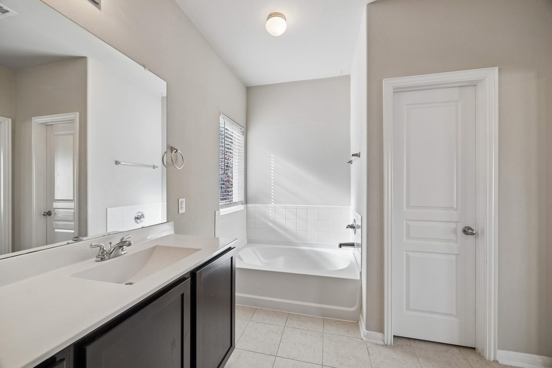 21264 Flowering Crape Myrtle Drive, Porter, TX 77365 A view of the large soaking tub. Look at the private water closet.
