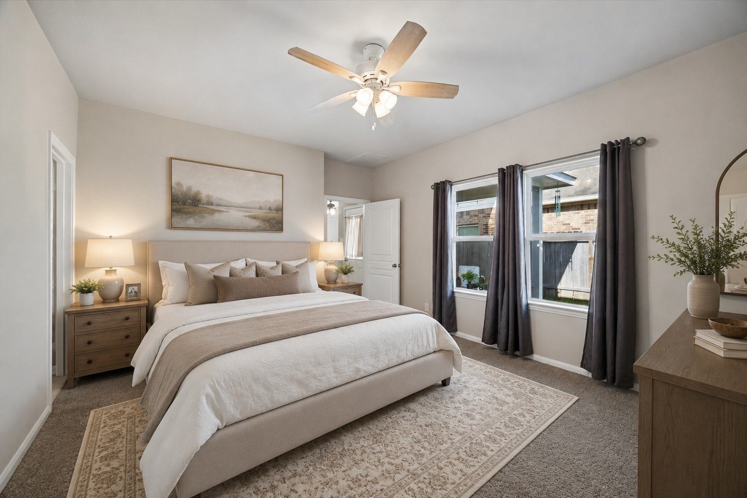 21264 Flowering Crape Myrtle Drive, Porter, TX 77365 Large Primary Bedroom is tucked away on the first floor for privacy. Digitally staged.