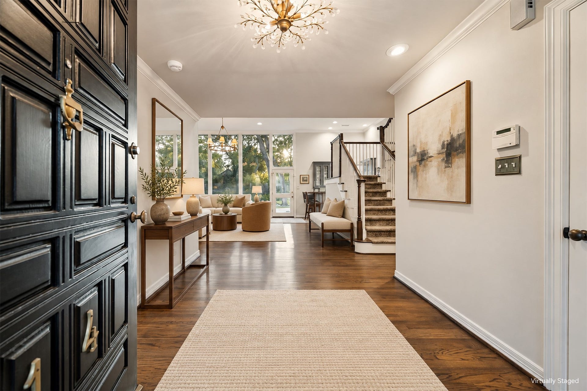 14 Stonegate Drive, Houston, TX 77024 Virtually Staged - Warm oak flooring greets guests as their eyes are immediately drawn to the beautiful backyard via the wall of glass across the back of the home.