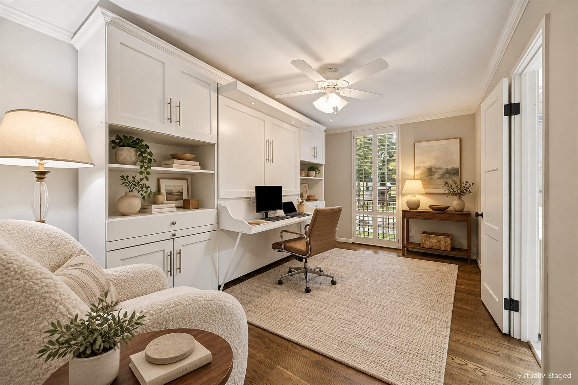 14 Stonegate Drive, Houston, TX 77024 Virtually Staged - Secondary bedroom being used as a second home office, currently hosts a murphy bed/desk and features an en suite bathroom.