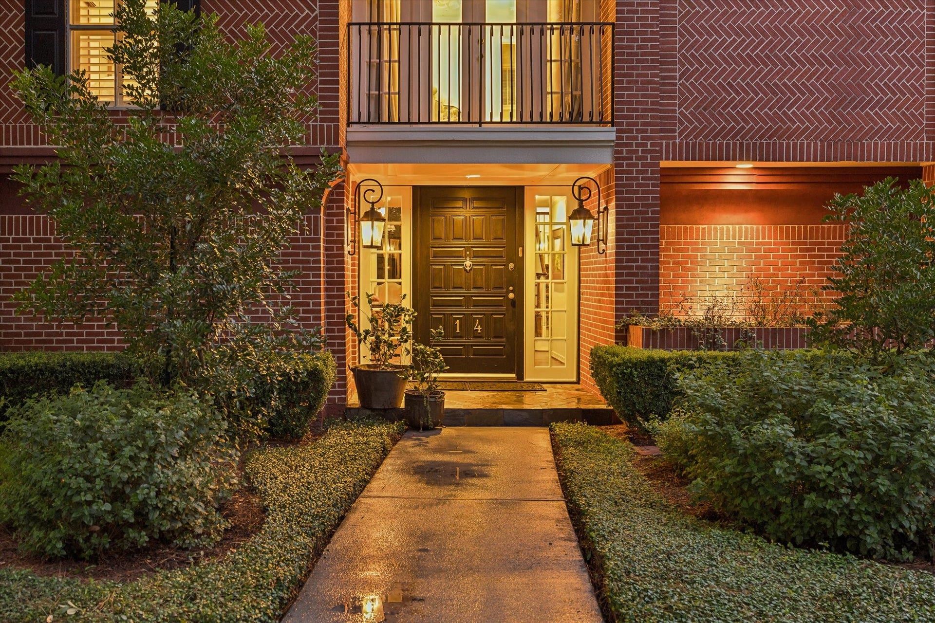 14 Stonegate Drive, Houston, TX 77024 Elegant approach framed by balanced lighting and landscaping.