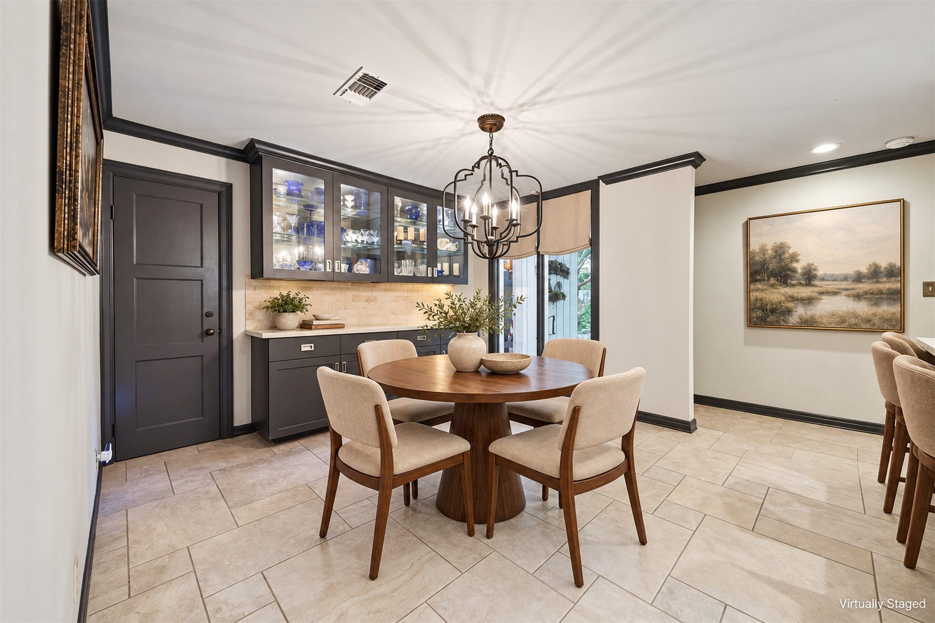 14 Stonegate Drive, Houston, TX 77024 Virtually Staged - Breakfast room located just off of the kitchen, features built-in banquet and storage closet.