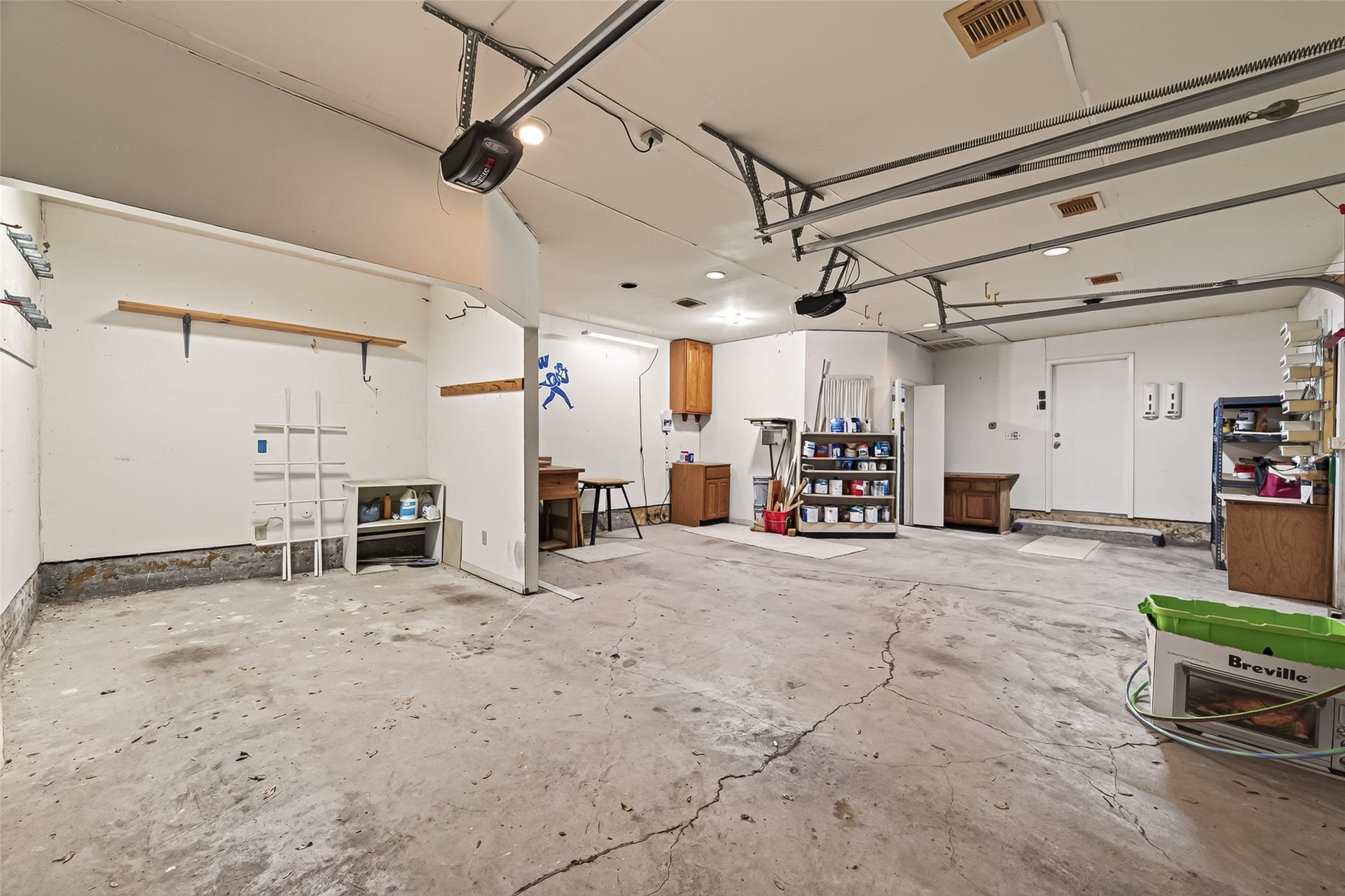 Very special almost 3 car garage! Bring your golf cart, workshop and all of the projects. Big things will happen in this oversized garage!