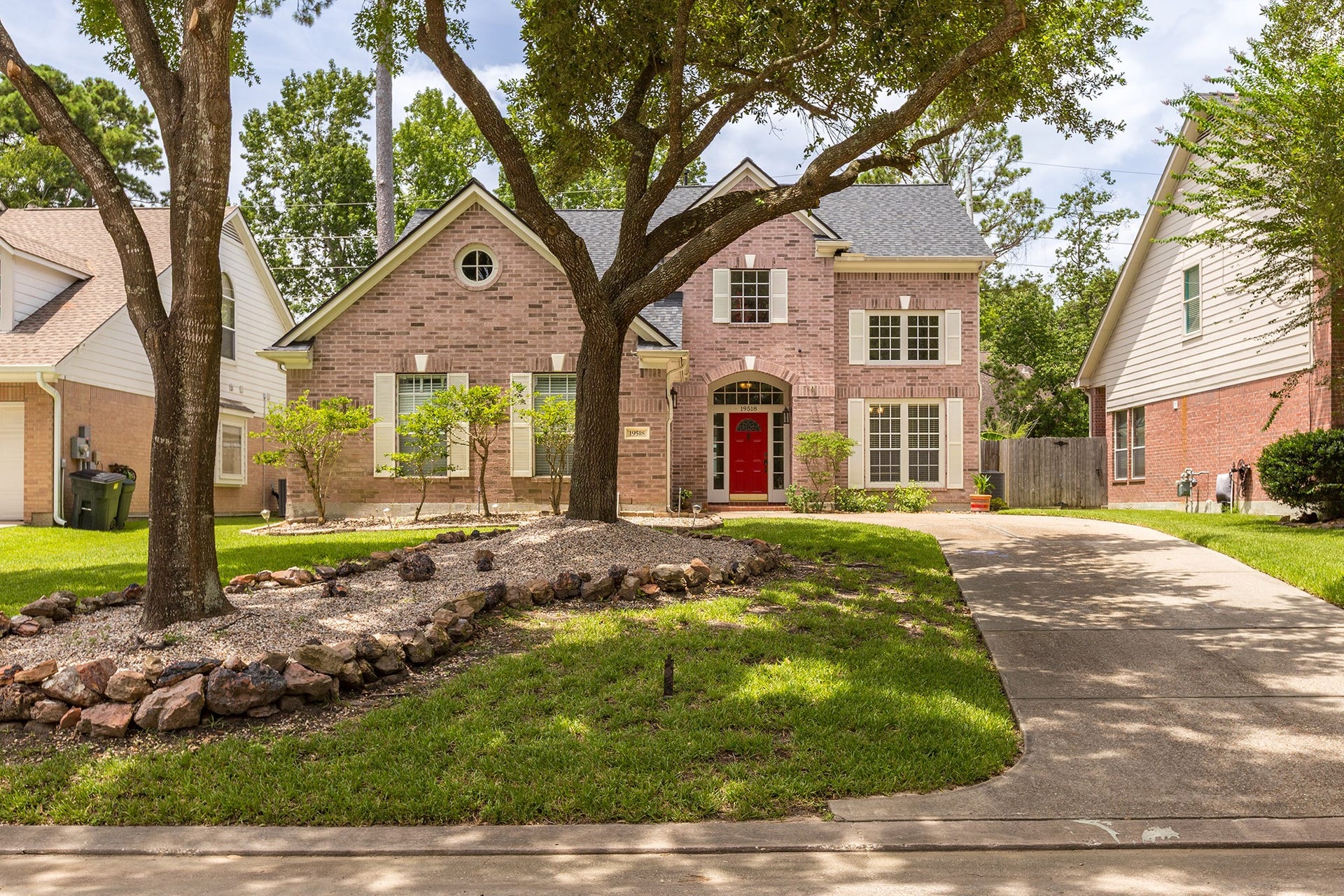 19518 Water Point Trail, Humble, TX 77346 Welcome to 19518 Water Point Trail - Charming two-story brick home with four bedrooms and a sparkling pool, framed by mature trees and lush landscaping!