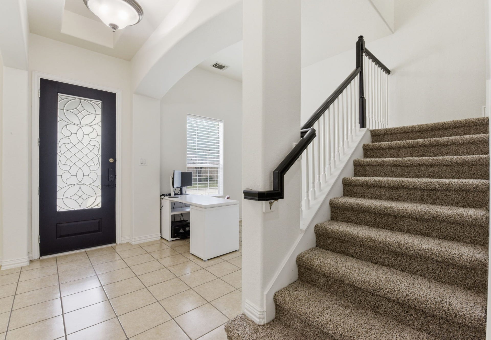 16023 Powder Springs Lane, Houston, TX 77070 Another look at the entry with a glance at the home office area and the stairs. (Recently replaced carpet on the stairs!)