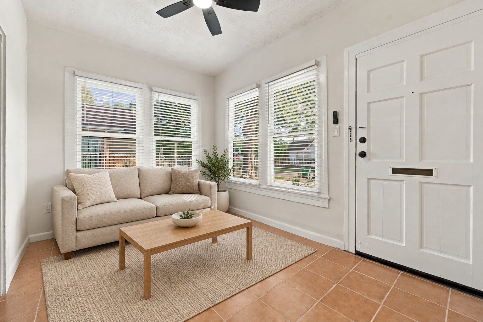 5129 Claremont Street, Houston, TX 77023 Unit 2: Living room with plenty of natural light. Virtually staged.