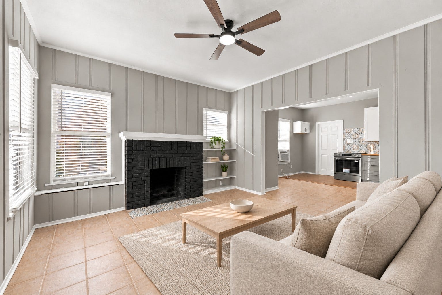 5129 Claremont Street, Houston, TX 77023 Unit 1: Living room that opens up to the kitchen. Virtually staged.