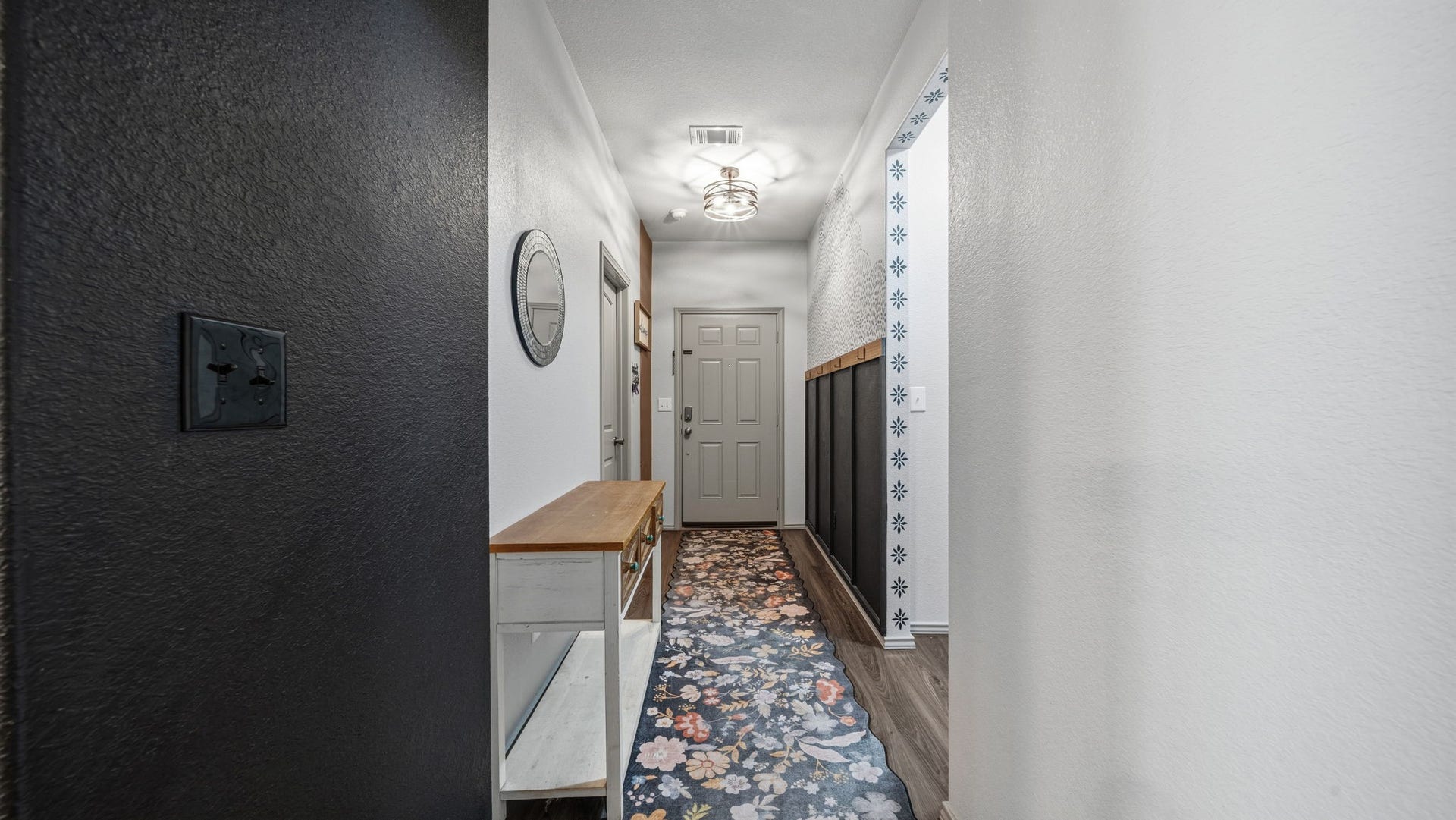 4170 Hidden Timbers Lane, Conroe, TX 77304 Make yourself at home! This inviting entryway features stylish flooring, decorative touches, and a welcoming first impression.