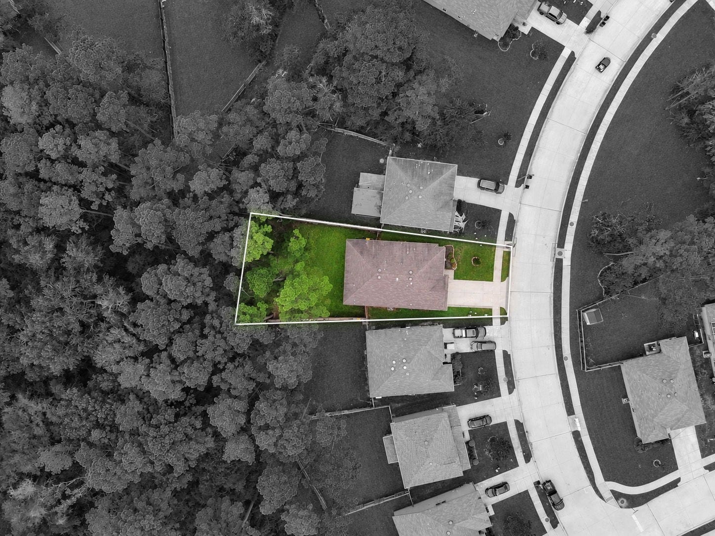 4170 Hidden Timbers Lane, Conroe, TX 77304 Look at that backyard! This aerial view highlights the property's generous outdoor space, fully fenced yard, and beautiful tree-filled surroundings.