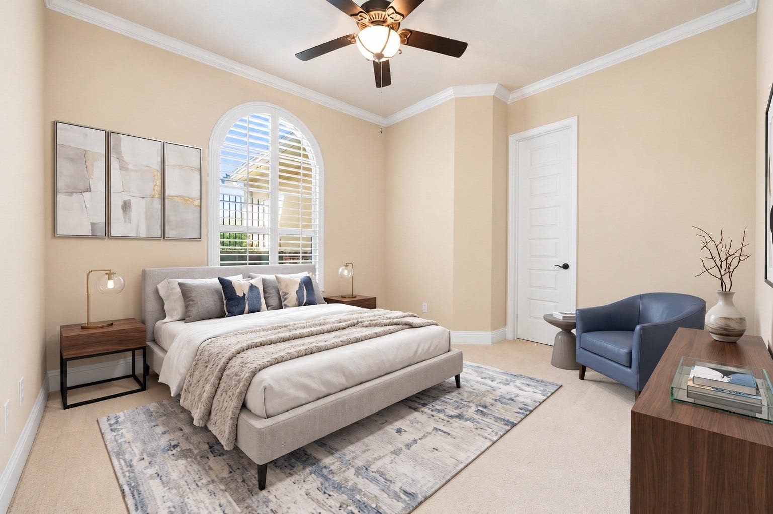 34 Edgemont Court, Fulshear, TX 77441 This secondary bedroom offers a bright, versatile space with plush carpet and a ceiling fan. Virtually staged.