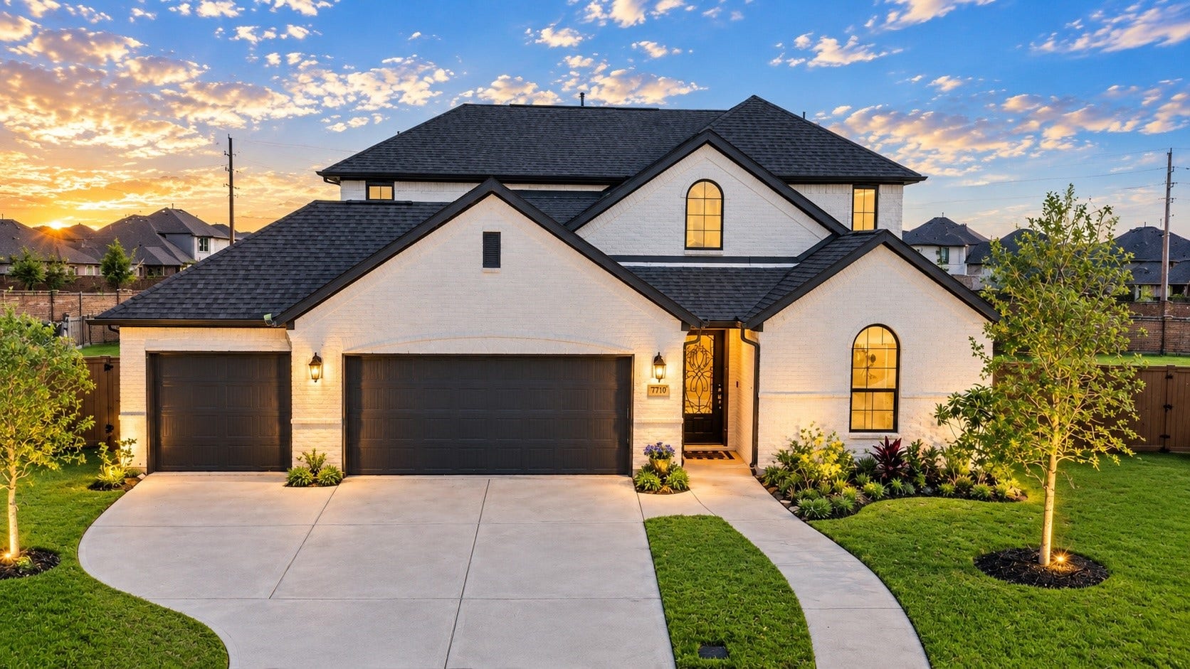 717 Lacosta Creek Lane, Katy, TX 77493 Stunning curb appeal welcomes you home with modern architecture and a spacious three car garage.
