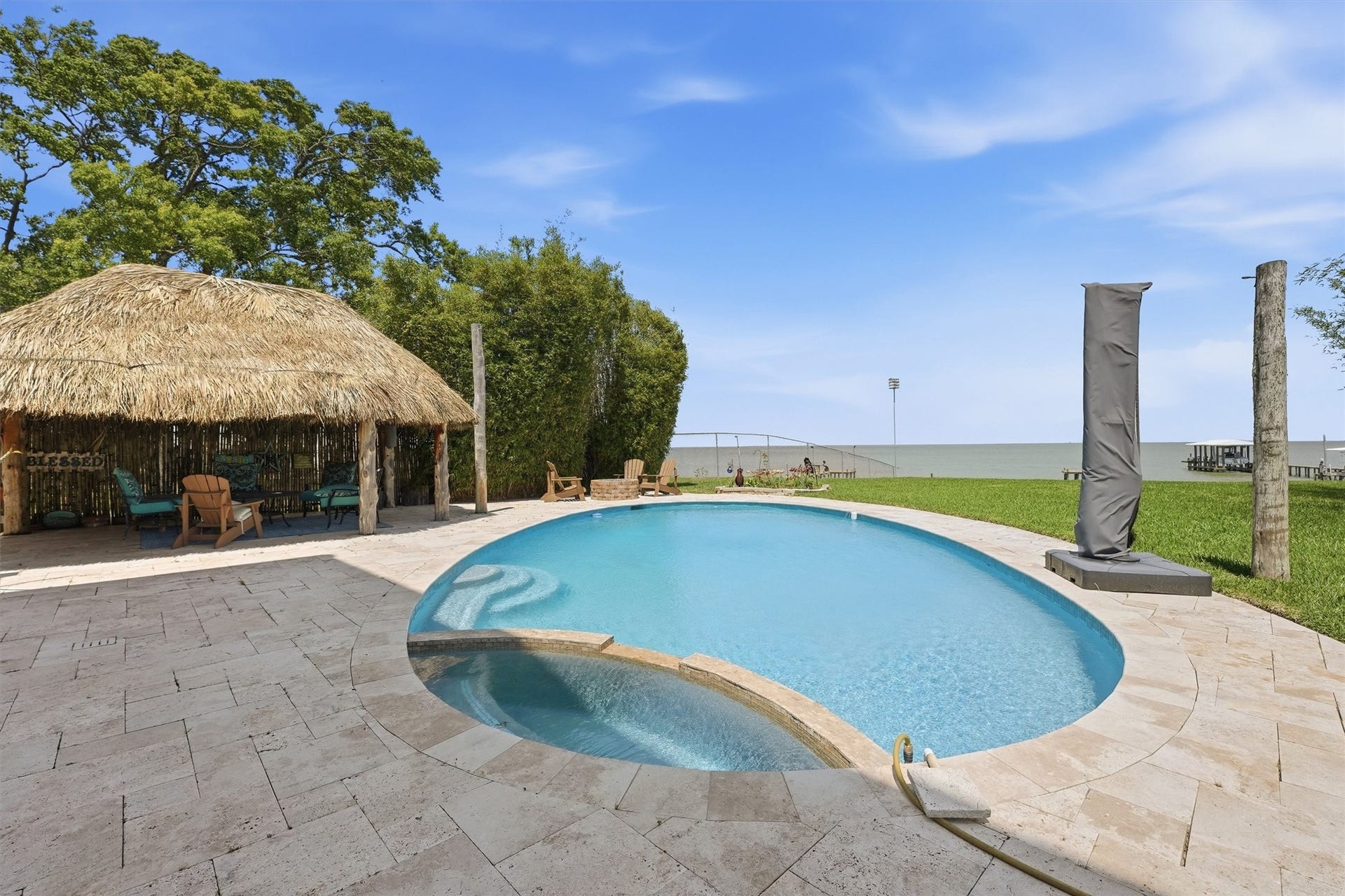 4019 Bayshore Drive Drive, Bacliff, TX 77518 Pool, palapa, gas fire pit, hot tub all makes the day troubles go away