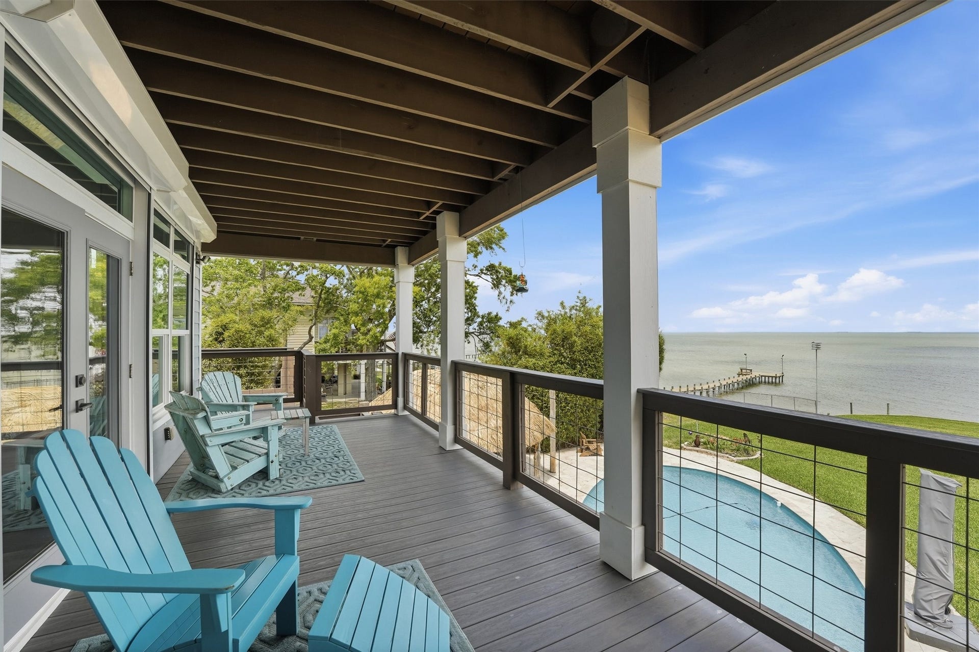 4019 Bayshore Drive Drive, Bacliff, TX 77518 French doors lead to main level balcony